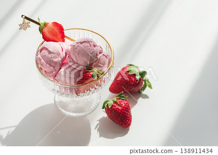 Strawberry Ice Cream with Fresh Strawberries on White Table 138911434