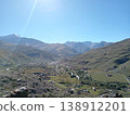 Aerial view of a traditional mountain village, North Ossetia, Caucasus, Russia. Dense residential area with natural mountain backdrop 138912201
