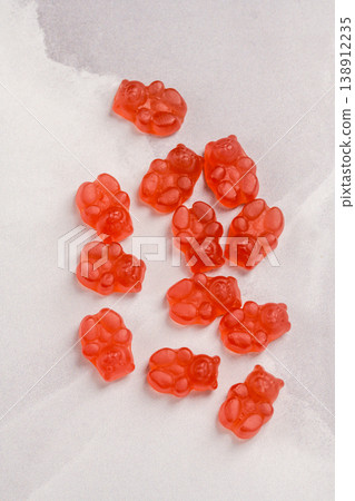 Jelly gummy bear fruit vitamins on bright background, food supplements.Vitamins candies Jelly gummy bear fruit vitamins on bright background, food supplements.Vitamins candies 138912235