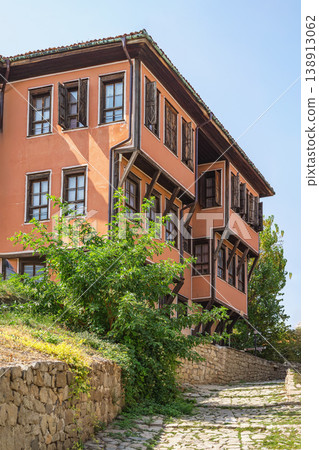 Lamartine House in Plovdiv with wooden bay windows, extended facade on stone street in old town Bulgarian Revival architecture landmark. Object of cultural heritage, historic architecture Lamartine House in Plovdiv with wooden bay windows, extended facade on stone street in old town Bulgarian Revival architecture landmark. Object of cultural heritage, historic architecture 138913062