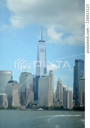 Dramatic City Skyline Showcasing Diverse Architectural Styles With Water Foreground Dramatic City Skyline Showcasing Diverse Architectural Styles With Water Foreground 138913123