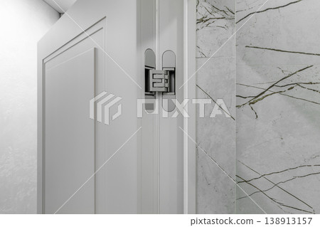 Close-up of Concealed Hinge on White Classic Door Close-up of Concealed Hinge on White Classic Door 138913157