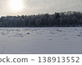 a frozen wide river completely covered with frosts, a river covered with pure white fresh snow after snowfalls and frosts 138913552