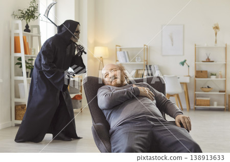 Senior Man With Heart Attack And Grim Reaper At Home Senior Man With Heart Attack And Grim Reaper At Home 138913633