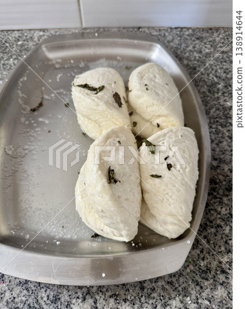 Traditional Cypriot homemade halloumi cheese. Mediterranean cuisine, delicious home cooking. Traditional Cypriot homemade halloumi cheese. Mediterranean cuisine, delicious home cooking. 138914644