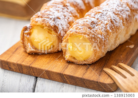 Cornet placed on a cutting board Cornet placed on a cutting board 138915003