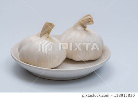 Two cloves of garlic Two cloves of garlic 138915830
