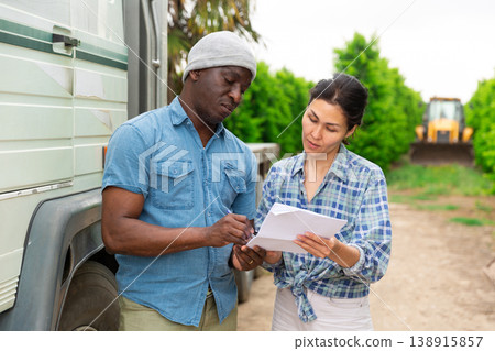 Man and woman are talking about trucking 138915857