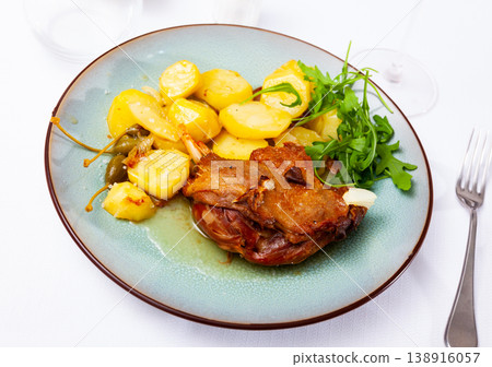 Confit duck with boiled potato and arugula Confit duck with boiled potato and arugula 138916057