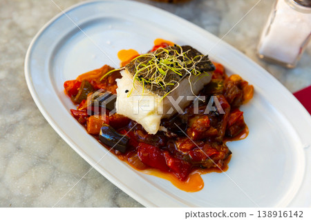 traditional mediterranean atlantic cod with ratatouille for lunch traditional mediterranean atlantic cod with ratatouille for lunch 138916142