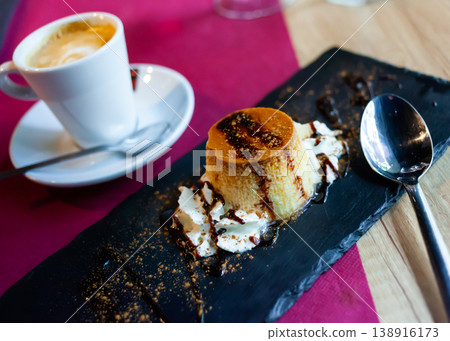 Flan with cream served on table Flan with cream served on table 138916173
