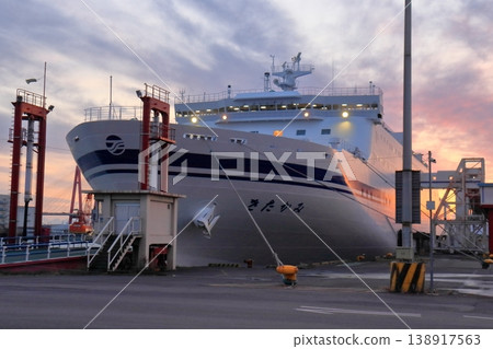 The Kitakami, docked at Nagoya Port ferry terminal, before its departure at dusk. The Kitakami, docked at Nagoya Port ferry terminal, before its departure at dusk. 138917563