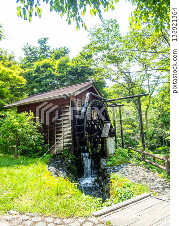 A watermill nestled in the mountains, visited on a refreshing early summer motorcycle tour. 138921364