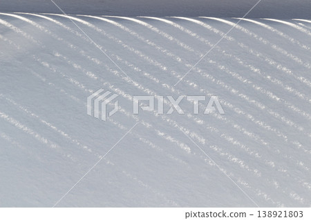 Shadows in the snow 138921803