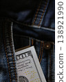 Dollar money in the pocket of jeans. Cash concept. 138921990