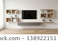Television floating console unit mounted on a white wall with wooden shelves and potted plants in a modern living room 138922151