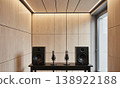 Recording studio microphones speakers sit on desk in a minimalist room with wood acoustic wall panels and copy space 138922188