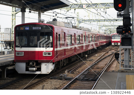 An Airport Express train bound for Haneda Airport departing from Keikyu Kawasaki Station. An Airport Express train bound for Haneda Airport departing from Keikyu Kawasaki Station. 138922446