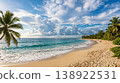 A tropical paradise, a stunning beach, palm trees and emerald green sea. 138922531