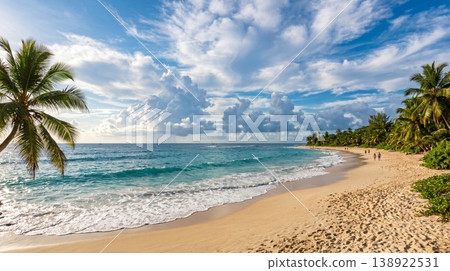 A tropical paradise, a stunning beach, palm trees and emerald green sea. 138922531