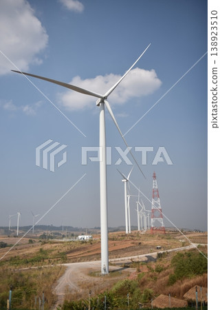 Sustainable Wind Farm with White Turbines and Power Infrastructure on Rural Hills 138923510