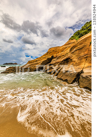 The beautiful coastal scenery of the southern islands, with its rocky and sandy beaches stretching across Takezaki Beach. The beautiful coastal scenery of the southern islands, with its rocky and sandy beaches stretching across Takezaki Beach. 138924944