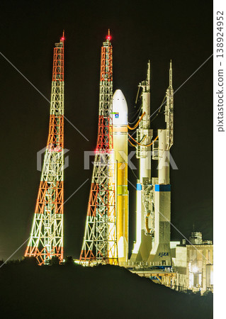 A night view of the Tanegashima Space Center and the H-III rocket the night before launch. A night view of the Tanegashima Space Center and the H-III rocket the night before launch. 138924952