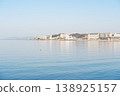 Mountains reflected on the tranquil surface of the lake, a waterside landscape woven from moonlight and islands. 138925157