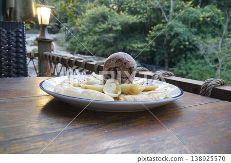 Plate of food with a dessert on top Plate of food with a dessert on top 138925570