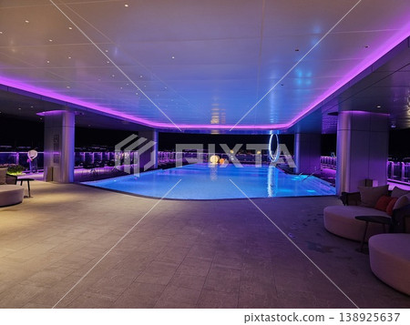 Pool with a purple light shining on it Pool with a purple light shining on it 138925637