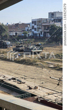 Military base is being built in a city Military base is being built in a city 138925679