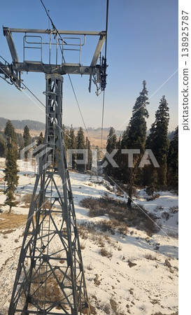 Tall metal pole with a ladder on it 138925787