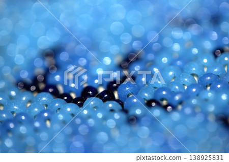 Cute craft small glass beads in an abstract pattern for background Cute craft small glass beads in an abstract pattern for background 138925831