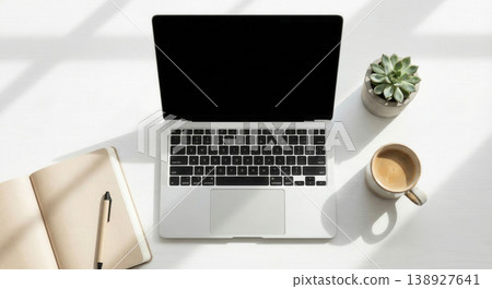 Bright Workspace Flat Lay with Laptop Coffee and Open Notebook 138927641