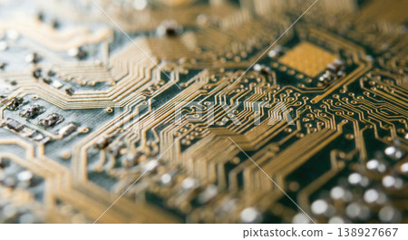 Close up of golden pathways on circuit board 138927667