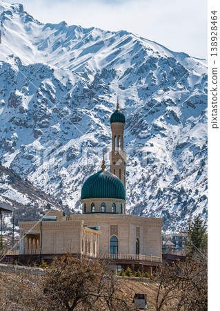 Mosque Surrounded by Snowy Mountains 138928464