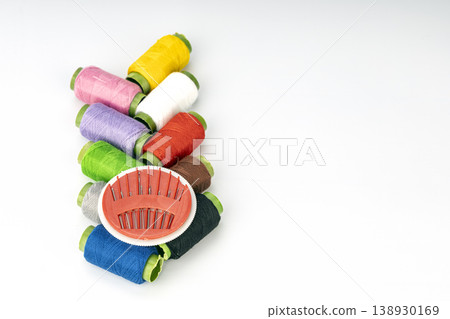 Vibrant Embroidery Thread Spools Collection with Red Needle Pincushion, Organizing Sewing and Crafting Supplies for Needlework Projects Vibrant Embroidery Thread Spools Collection with Red Needle Pincushion, Organizing Sewing and Crafting Supplies for Needlework Projects 138930169