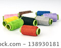 Colorful Thread Spools with Bright Green Bobbins - Professional Sewing and Embroidery Supplies Collection 138930181