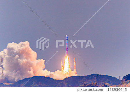 The H-III rocket launch and massive plume of smoke seen across the sea The H-III rocket launch and massive plume of smoke seen across the sea 138930645