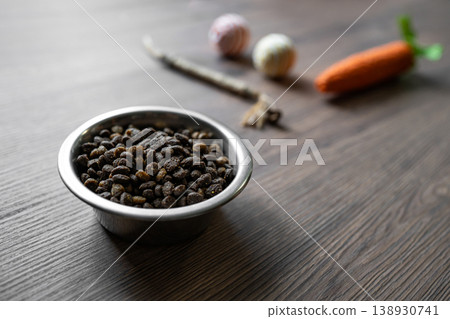 Cat dry food with toys blurred background pet care concept 138930741