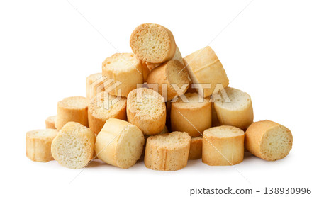 Pile of crispy croutons close-up on a white background. Isolated 138930996
