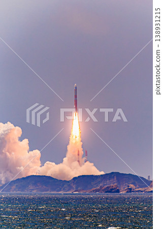 The H-III rocket and the rising plume of smoke seen across the sea. The H-III rocket and the rising plume of smoke seen across the sea. 138931215
