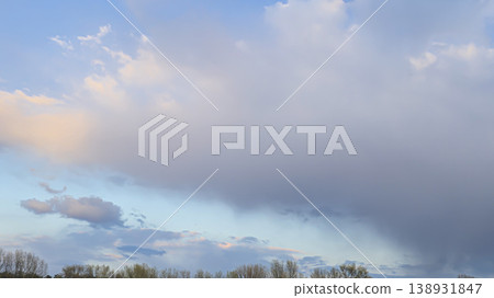 City sky with clouds, spring thunderstorms. Beautiful pink and orange clouds. City sky with clouds, spring thunderstorms. Beautiful pink and orange clouds. 138931847