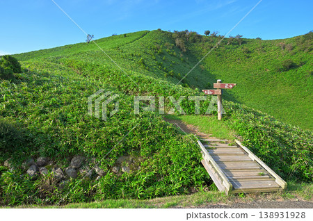 Izu Peninsula, Toda Parking Lot, entrance to the Izu Mountain Ridge Trail, summer green mountains. Izu Peninsula, Toda Parking Lot, entrance to the Izu Mountain Ridge Trail, summer green mountains. 138931928
