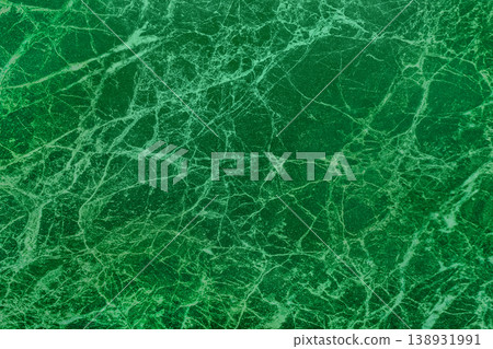 Malachite slab green marble verdant surface cracks kitchen interior structure abstract cracked pattern texture emerald background Malachite slab green marble verdant surface cracks kitchen interior structure abstract cracked pattern texture emerald background 138931991