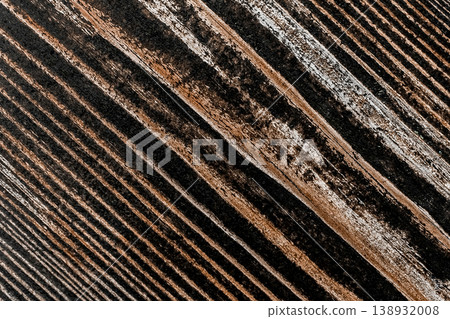 Closeup lines texture stripes old wooden dark brown surface wood background board pattern plank Closeup lines texture stripes old wooden dark brown surface wood background board pattern plank 138932008
