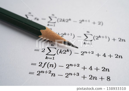 Pencil on mathematic formula exercise test paper in education school. Pencil on mathematic formula exercise test paper in education school. 138933310