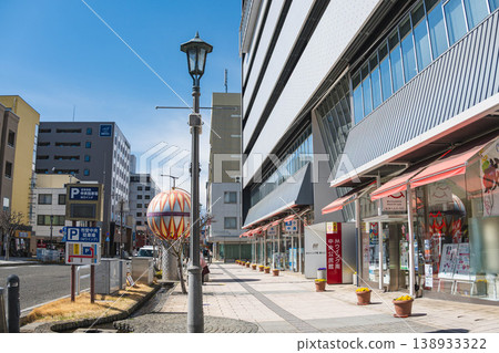 Streetscape and sidewalks around M-Wing in Matsumoto City, Nagano Prefecture, on a sunny day. Streetscape and sidewalks around M-Wing in Matsumoto City, Nagano Prefecture, on a sunny day. 138933322