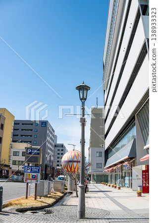 Streetscape and sidewalks around M-Wing in Matsumoto City, Nagano Prefecture, on a sunny day. Streetscape and sidewalks around M-Wing in Matsumoto City, Nagano Prefecture, on a sunny day. 138933323