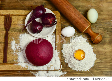 Purple dough bun for noodles with ingredients on the table. Purple dough bun for noodles with ingredients on the table. 138933528